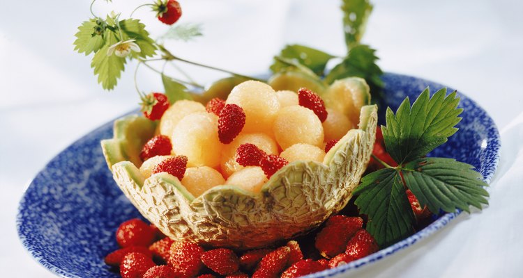 Strawberry and melon salad in hollowed out in cantaloupe