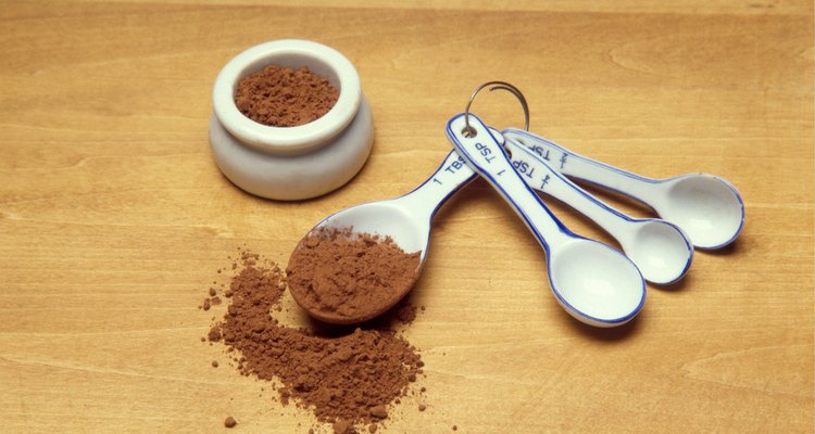 Cocoa powder in measuring spoons