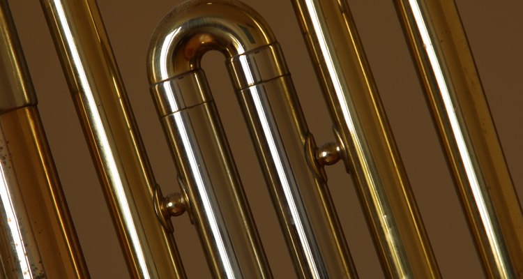 Brass is a shiny yellow metal that may sometimes be mistaken for gold. Some objects are plated with brass, while others are made of solid brass.