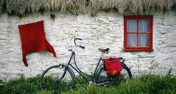 Bicycle outside a cottage, Cregnesh, Isle of Man, British Isles