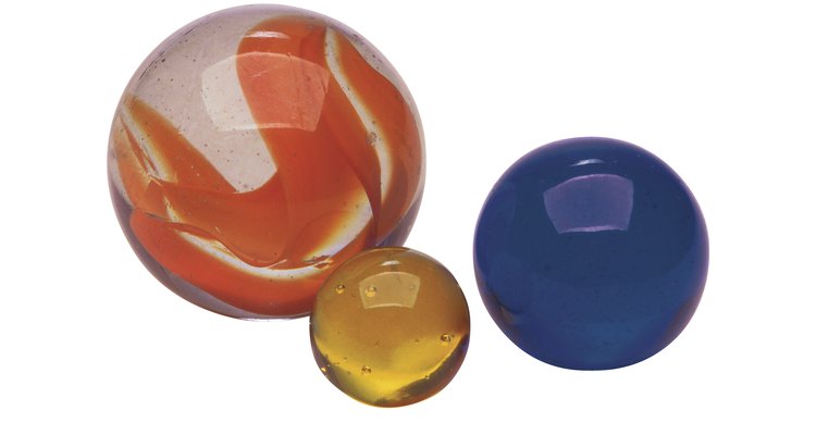 Some boys played marbles whilst others pretended to fight