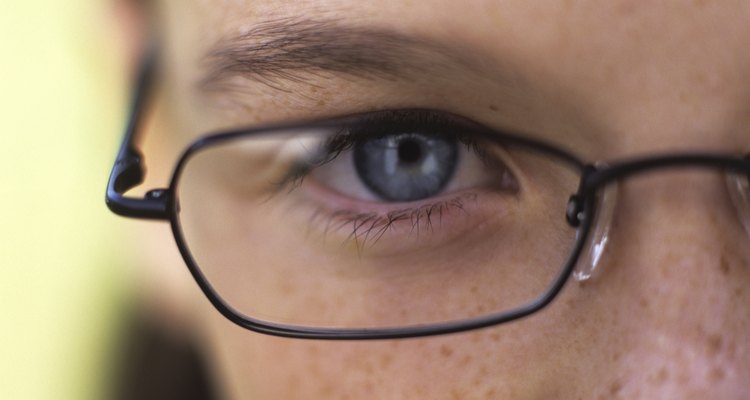 Girl (11-13) wearing glasses, close up, portrait