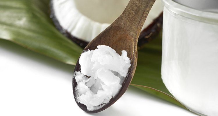 Close-up of coconut oil on the wooden spoon