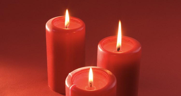 Lighting a few candles around the house is one easy way to decorate for a memorial service.