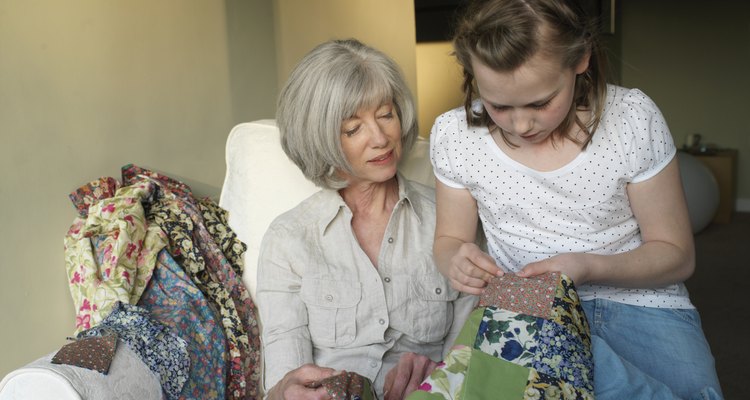 Snuggle up in a hand tied quilt with button decorations.