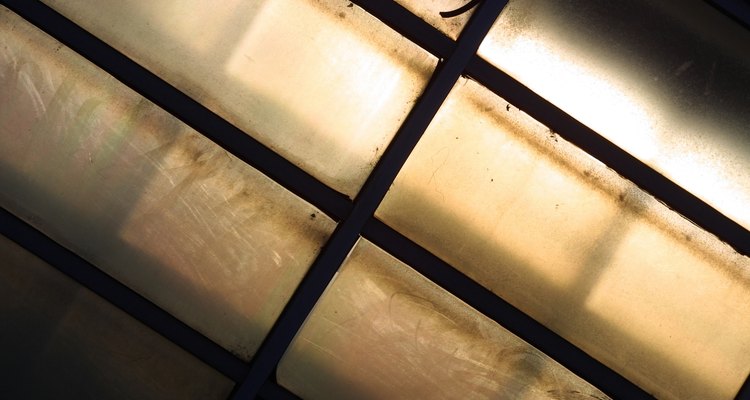 Put film on windows to whiten them and make them opaque.