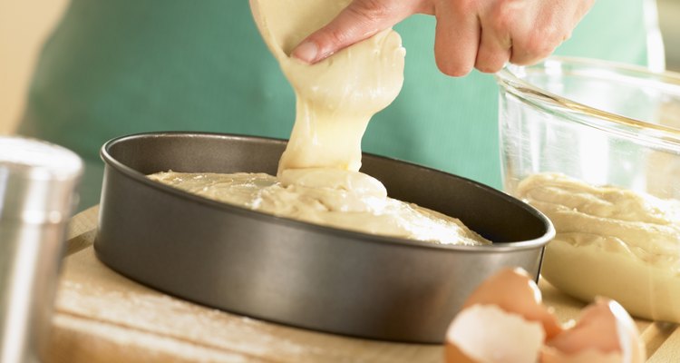 Pouring Cake Mixture Into Baking Tin