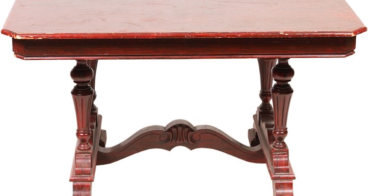 Remove white water stains and spots from your mahogany furniture carefully.
