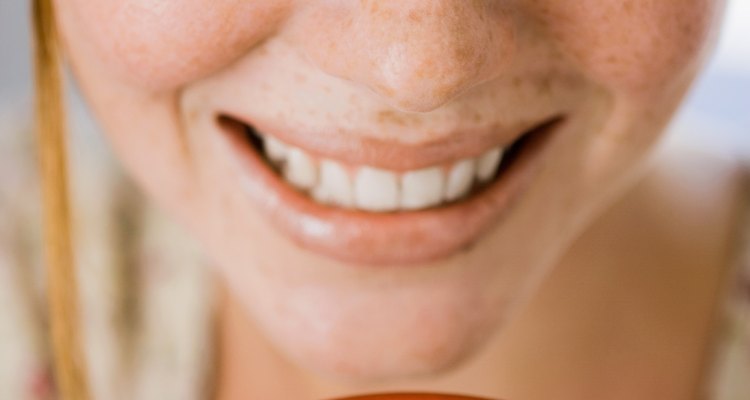 Woman with bowl of seeds