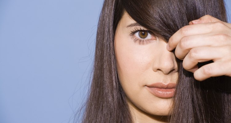 Woman with hair covering face