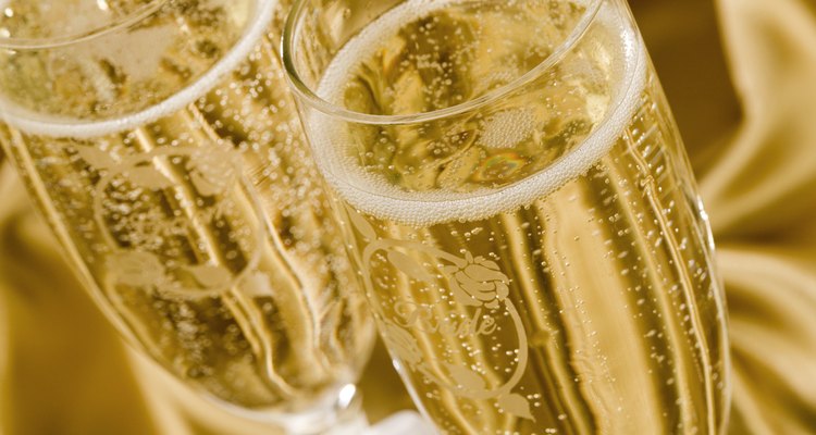 Champagne filled wedding glasses