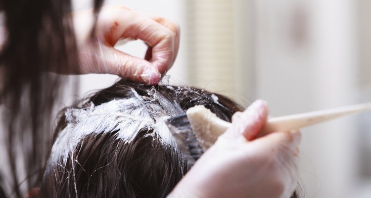 Hairdressing beauty salon. Woman dying hair. Hairstyle.