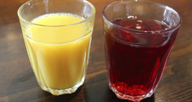 Image of glasses of orange juice and cranberry juice