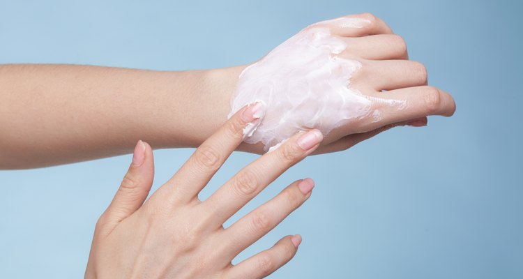 Skin care. Female palms with moisturizing cream.