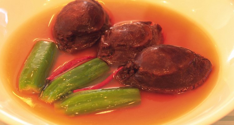 Closed Up Image of a Dish With Abalone and Green Vegetables, High Angle View