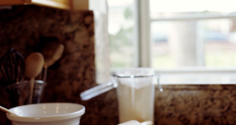 Mixing bowl, rolling pin and pie pan on kitchen counter