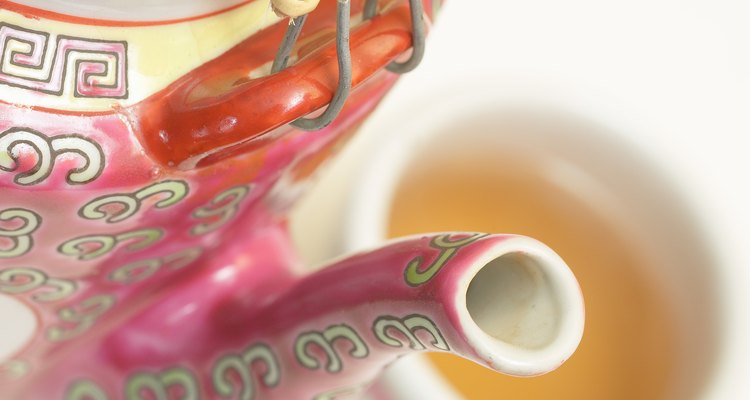 Give a plain teapot new life by painting it.