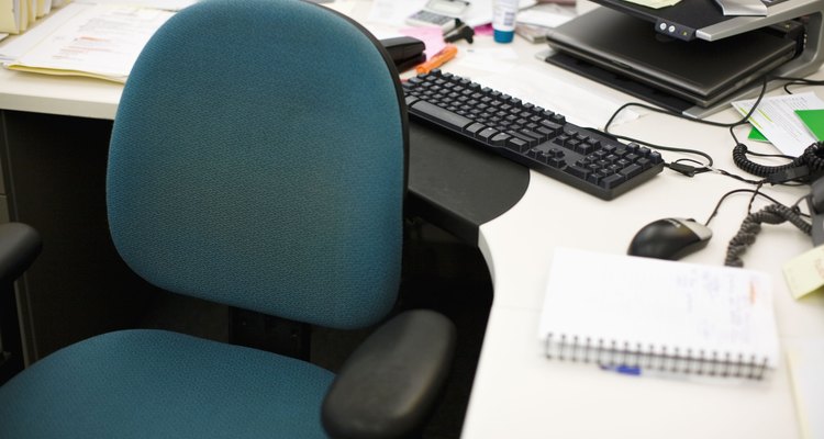 Enhance your boss's chair with a cushion or electronic massager.