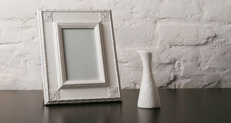 composition with vintage fotoframe and vase