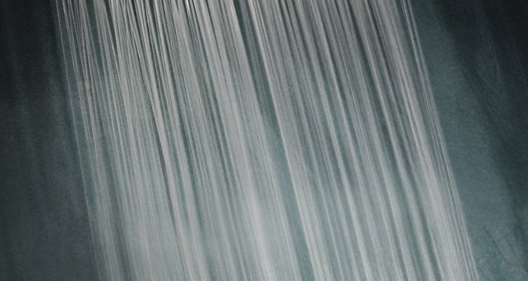 Disassemble a shower head to make simple repairs.