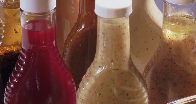 Salad with assorted bottles of dressing