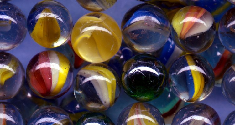 Lave e seque 15 a 20 bolinhas de gude e adicione-as ao creme