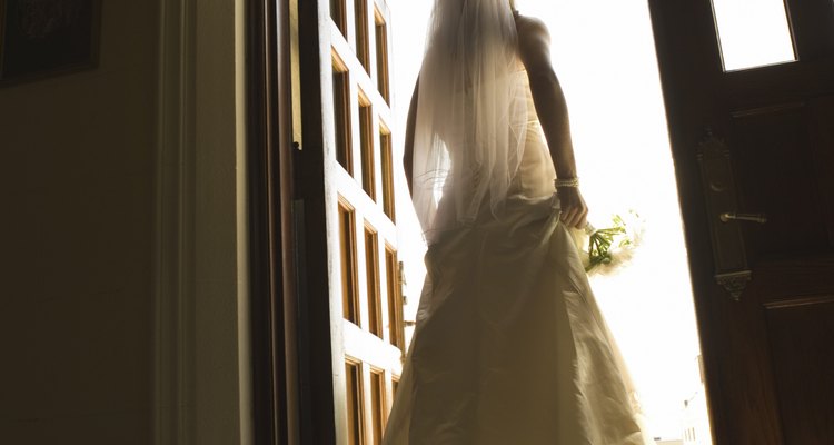 Bride standing in doorway