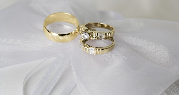 Wedding rings on ring bearer pillow