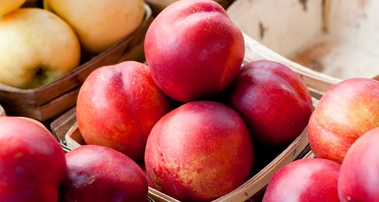 Plums in Basket at Market