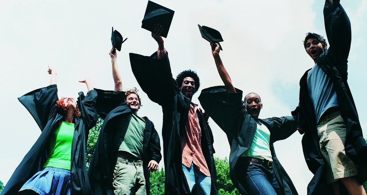 Five Students Jumping for Joy at Graduation