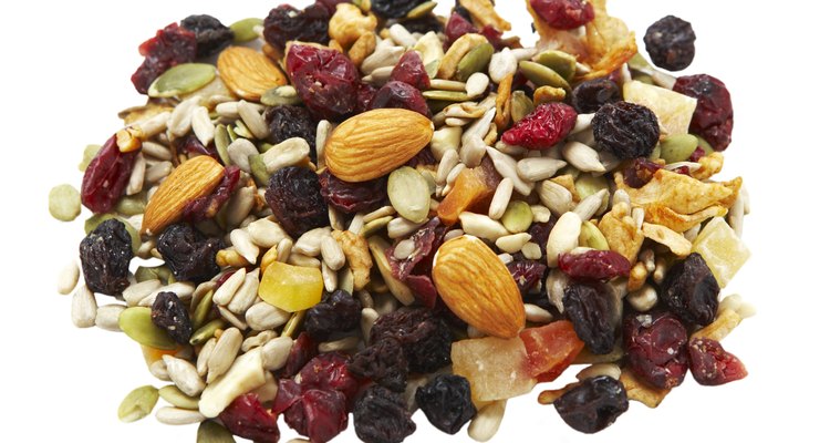 Heap of trail mix on white background