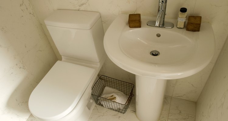 Clean the inside of your toilet tank to avoid unwanted bathroom smells.