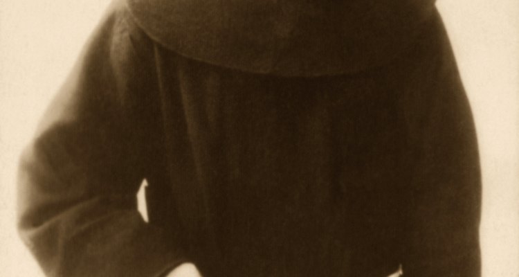 The brown Franciscan habit is belted with a rope girdle.
