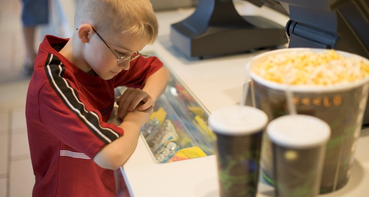 Boy at concession stand counter