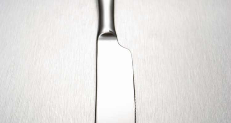 Use uma espátula ou borda de uma colher para remover geleca das roupas