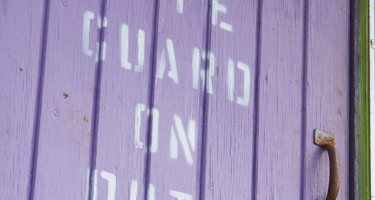 Use registration guide marks to line up stencil letters evenly.