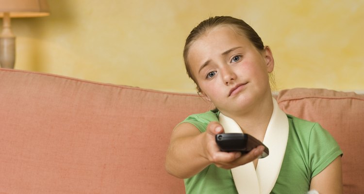 A girl wears a cuff and collar sling.