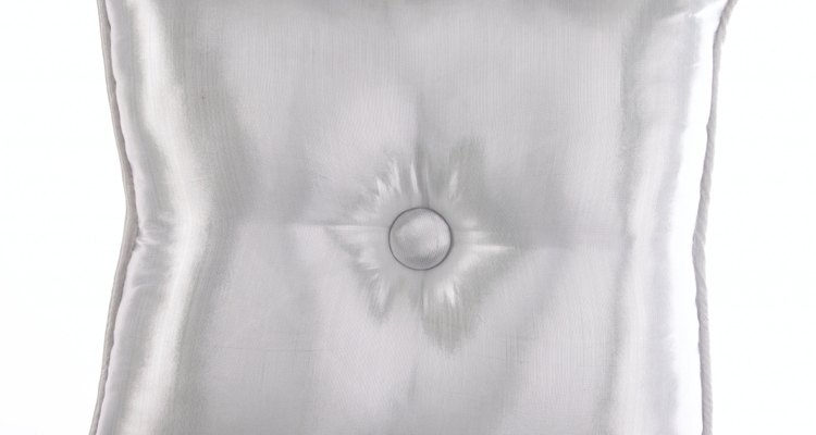 Pairs of buttons are also used to tuft pillows.
