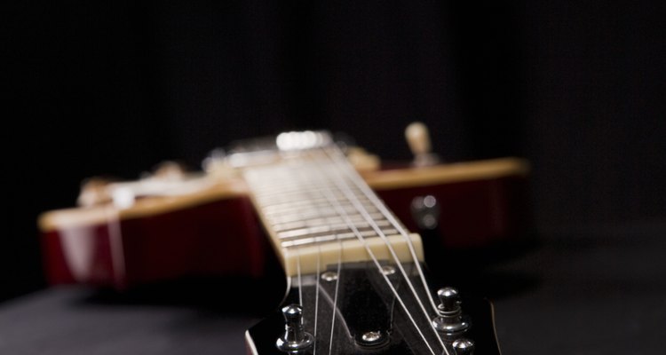 It's easy to remove an old waterslide decal from a guitar's headstock.