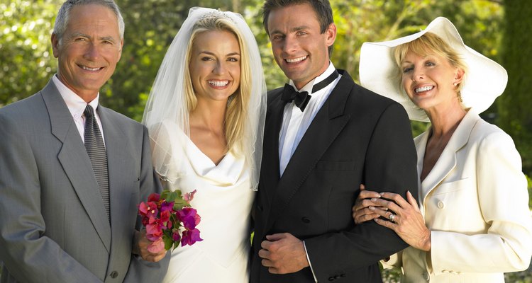 Bride and groom with man and woman