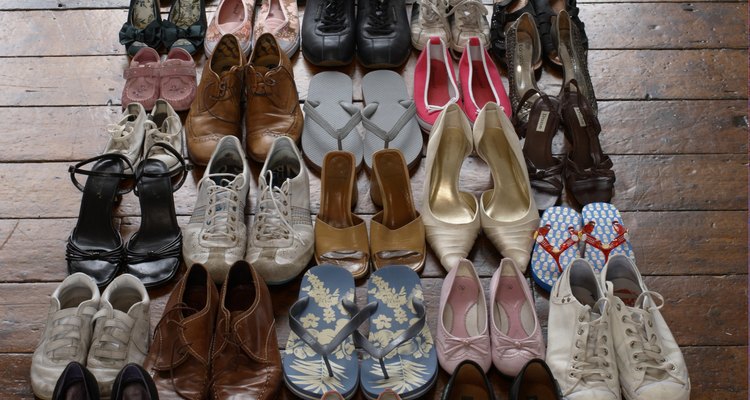 shoes neatly organised on wooden floor