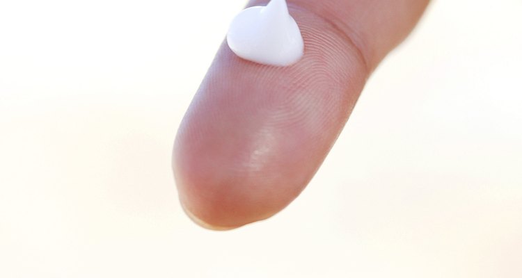 Drop of cream on a finger