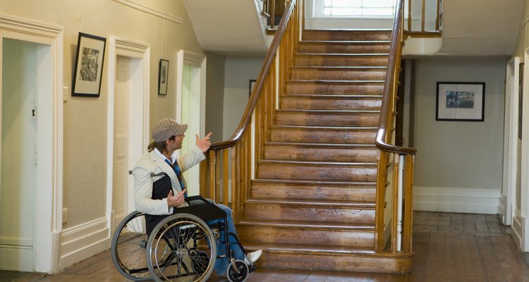 How to move a manual wheelchair upstairs
