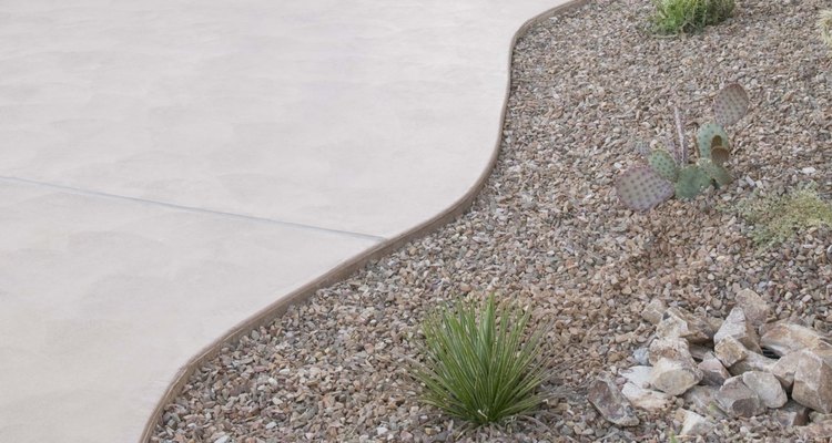 Cut curves in pavers with a cut-off saw.