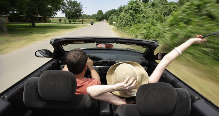 Couple Driving Down Country Road