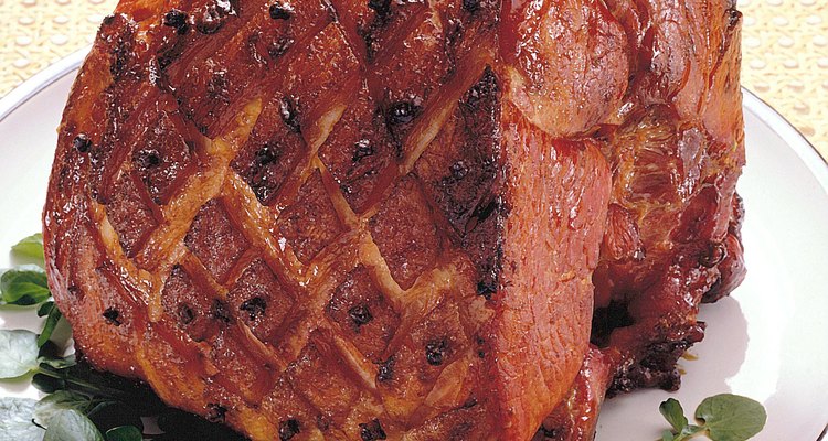 Score the fat on the side of the ham in a diamond pattern to add visual appeal.
