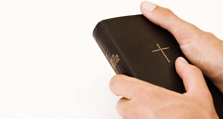 Person holding Bible