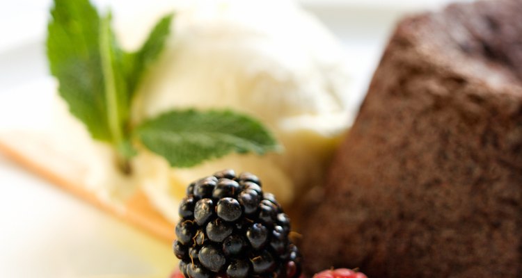 Enjoy a piece of leftover cake with fresh fruit.