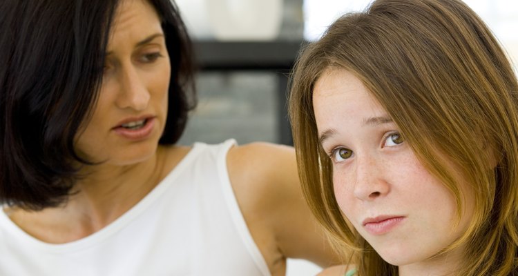 Unhappy mother talking to daughter