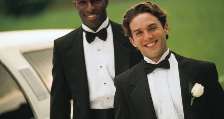 Groom and best man in tuxedos